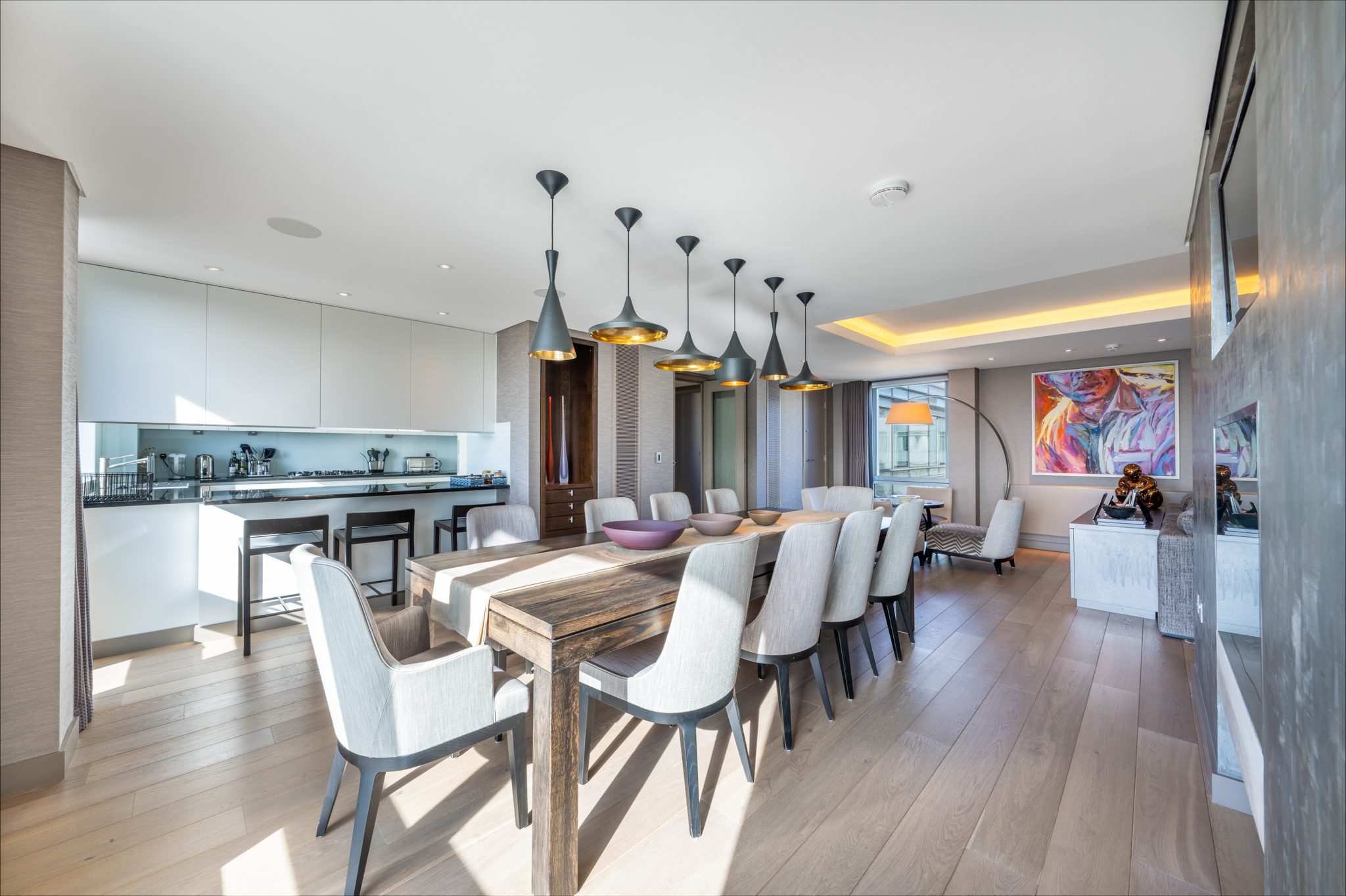 Open-plan kitchen, dining and living area photographed for a London property listing